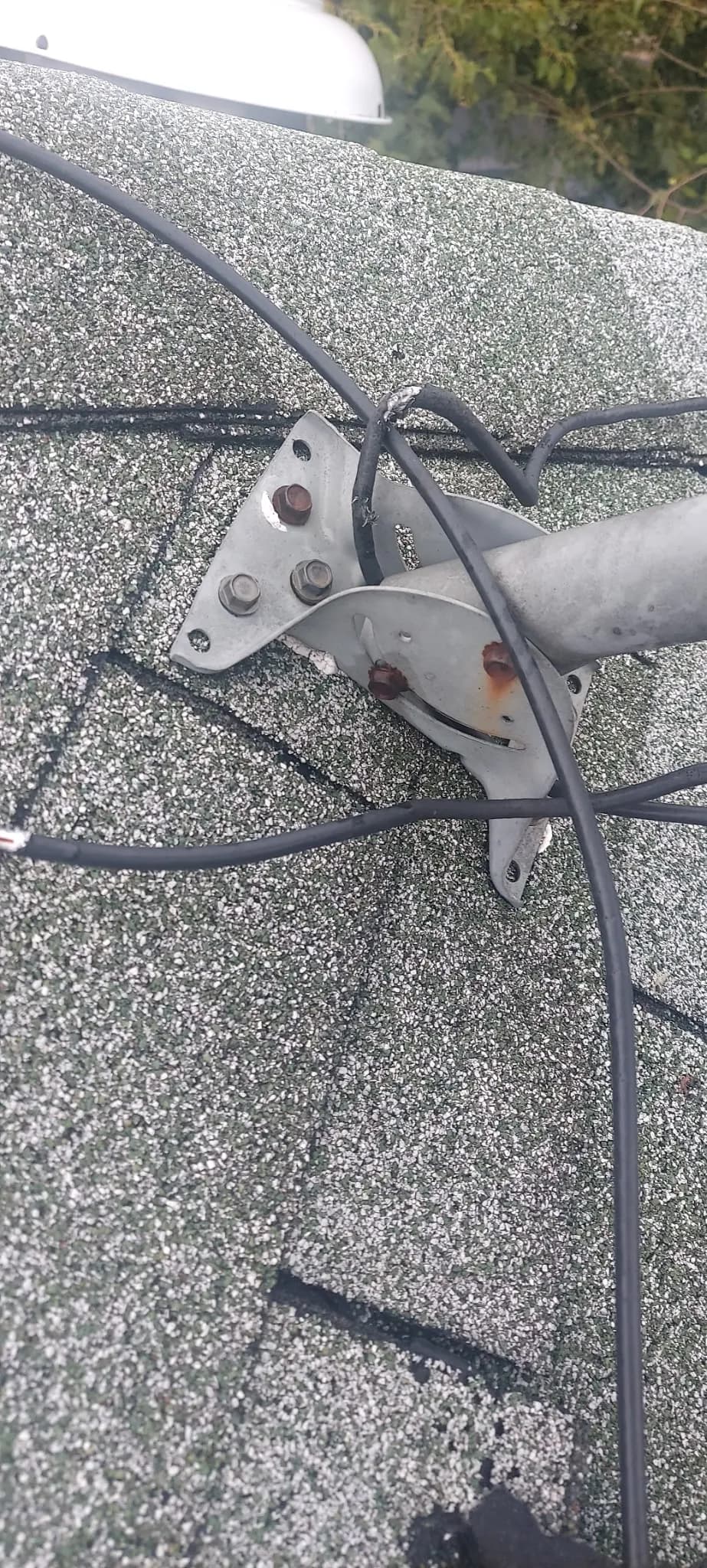 Old Satellite Dish Mounts Are Quietly Destroying Roofs in Northern Virginia image