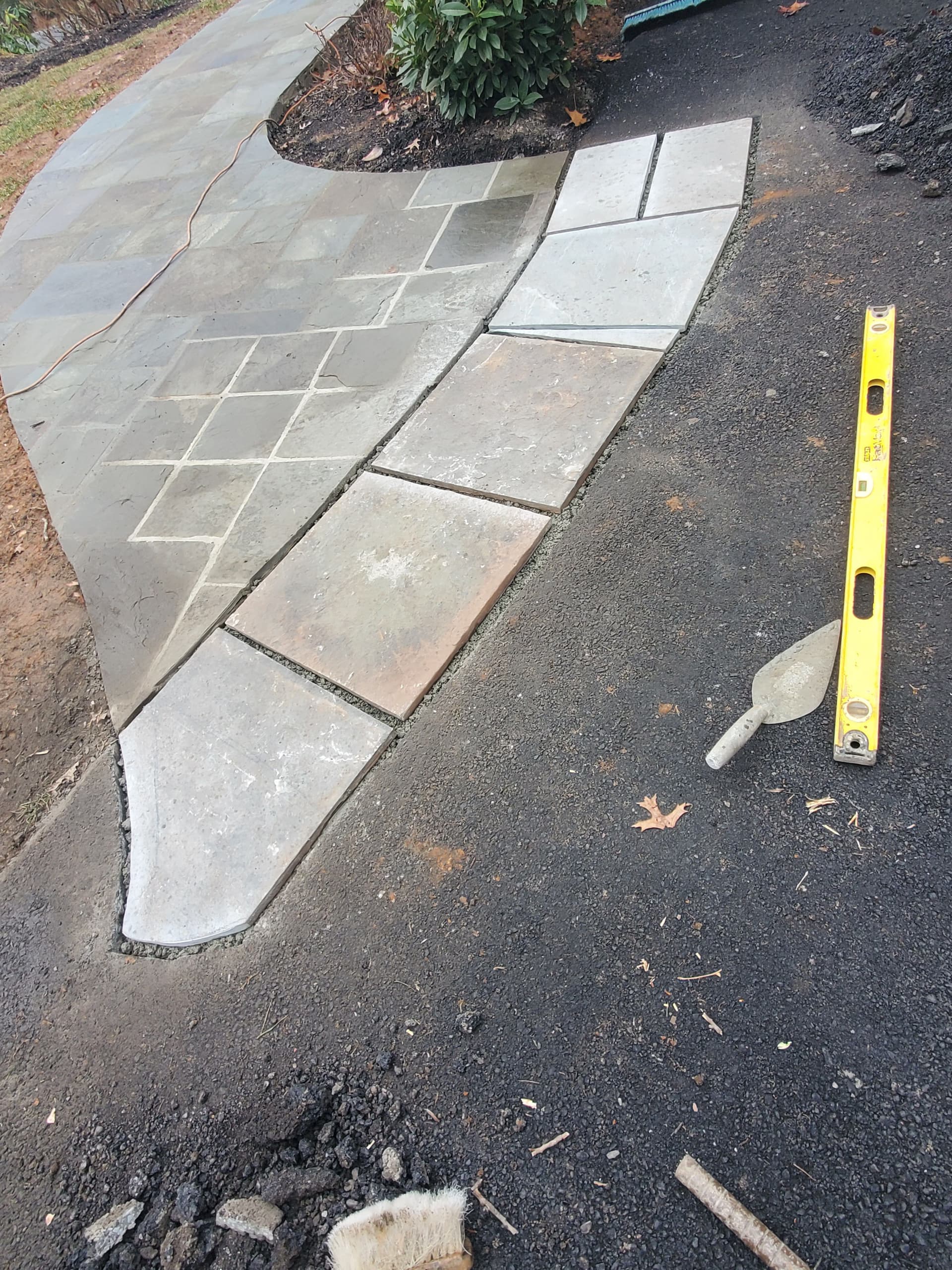 Gallery photos for Cracked Sidewalk Gone - Stamped Patio and Stone Wall Built Right: Image #9
