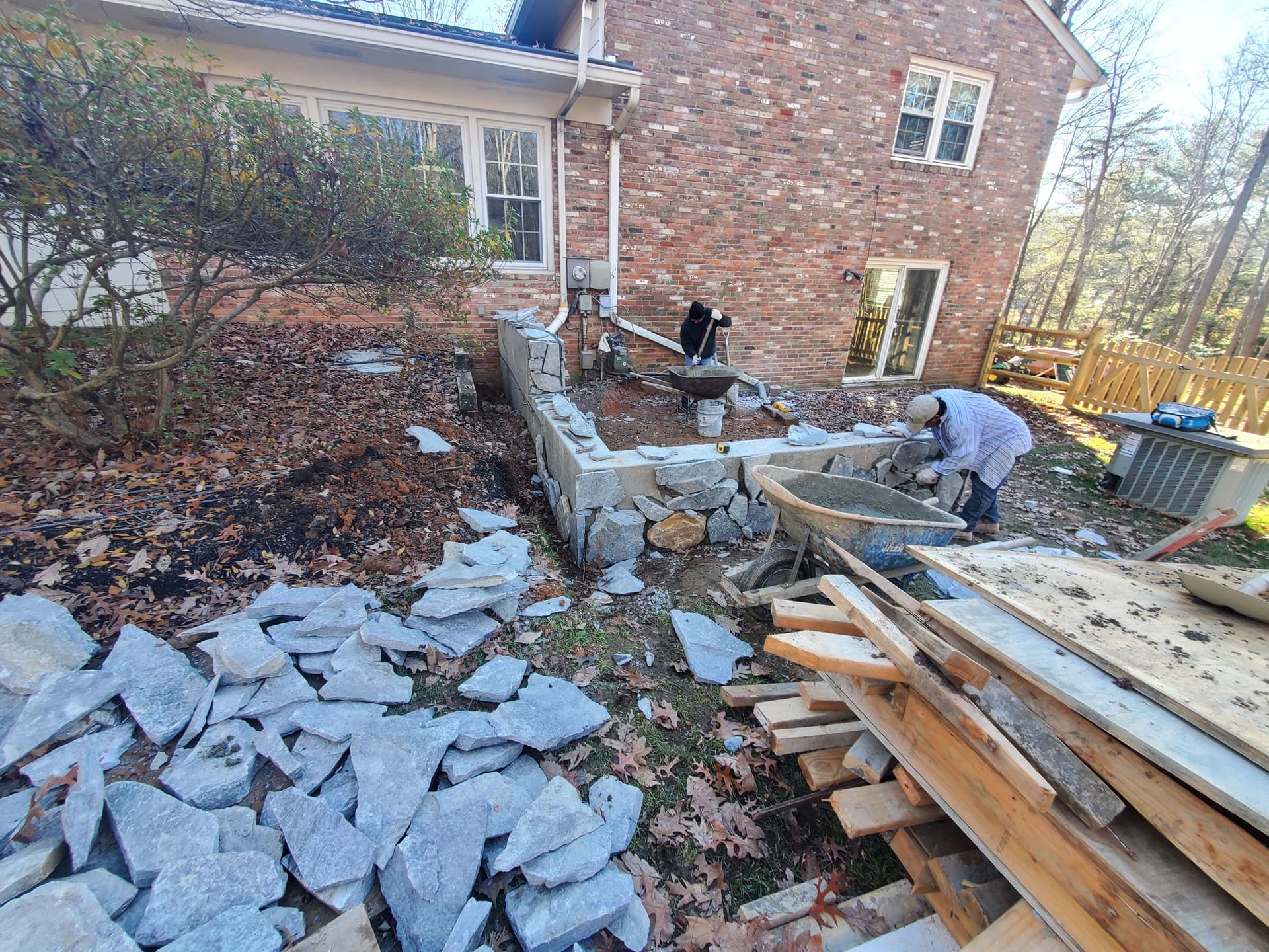 Gallery photos for Cracked Sidewalk Gone - Stamped Patio and Stone Wall Built Right: Image #5