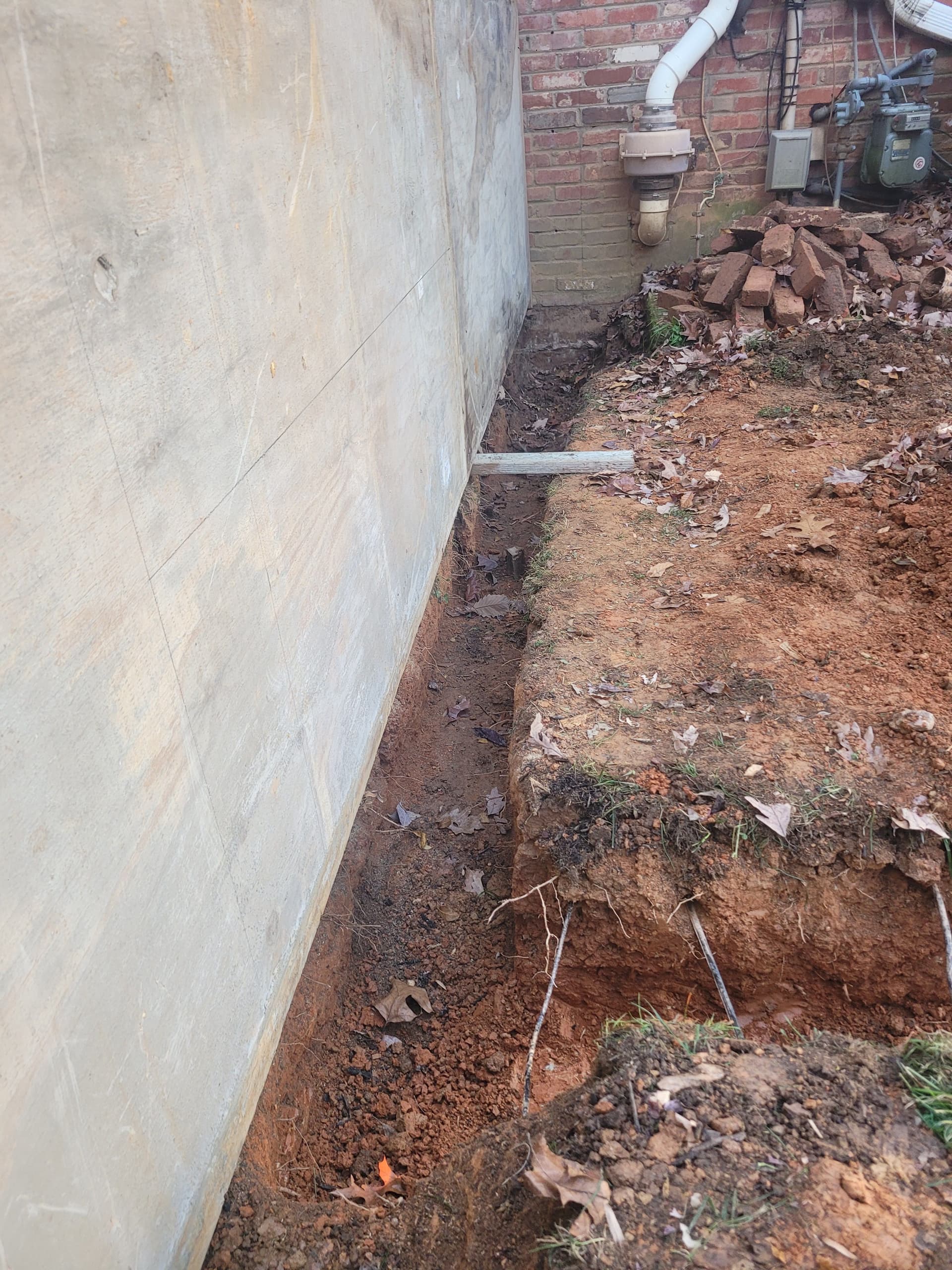 Gallery photos for Cracked Sidewalk Gone - Stamped Patio and Stone Wall Built Right: Image #4